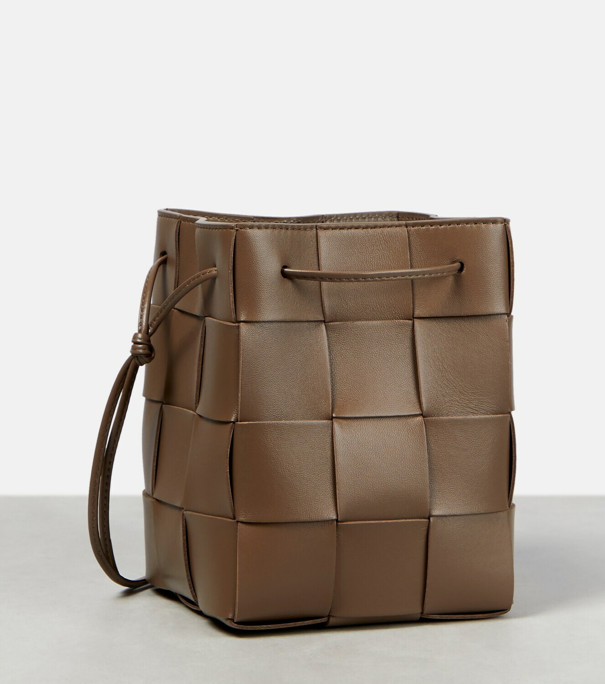 【BOTTEGA VENETA】Small Leather Cassette Bucket Bag Sunburst Bottega Veneta Small Cassette Bucket Bag in Sunburst & Gold