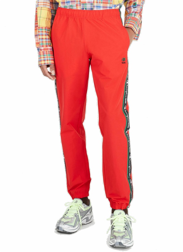 Photo: Logo Tape Track Pants in Red
