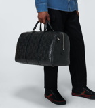 Gucci - GG embossed leather duffel bag