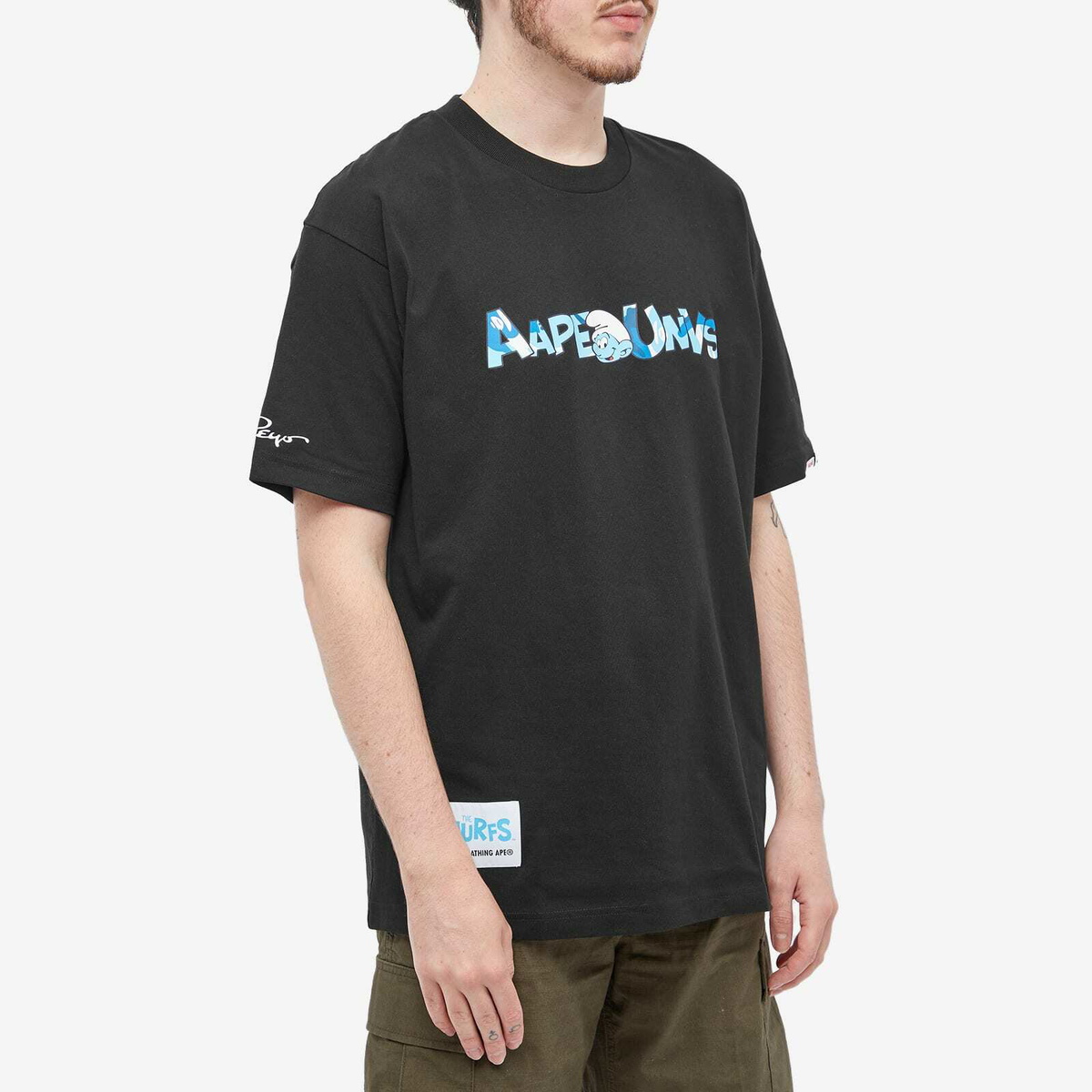 Men's AAPE x Smurfs Face Smurf T-Shirt in Black AAPE by A Bathing Ape