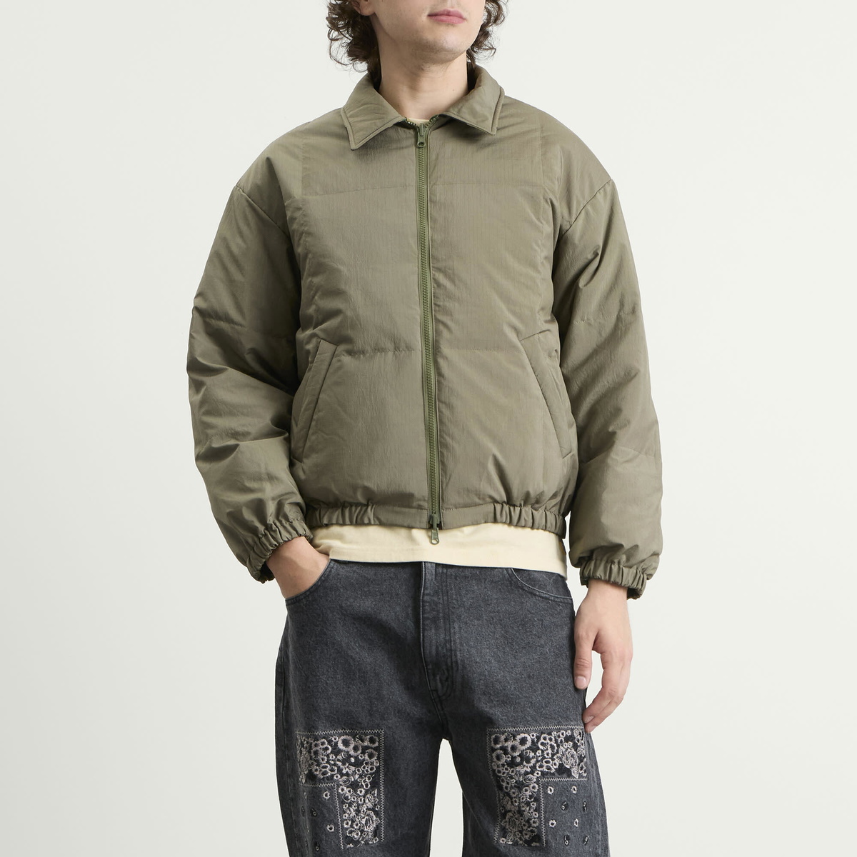 NOMARHYTHM TEXTILE Men's Camo Flower Reversible Down Puffer Jacket in Olive