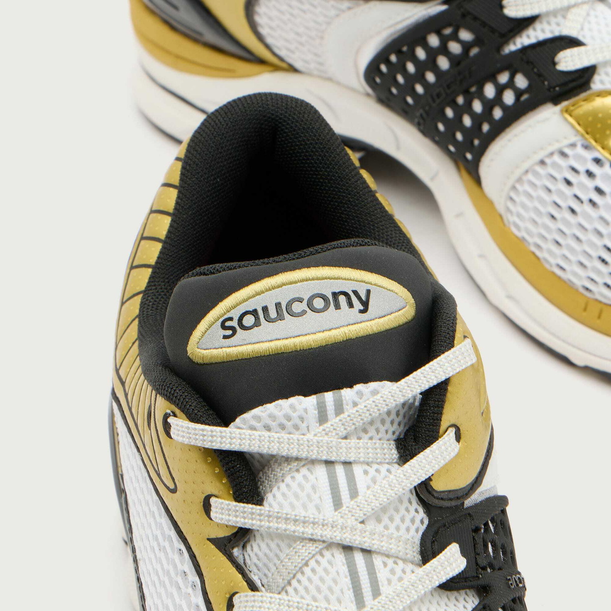 Saucony Men's Progrid Paramount Sneaker in White/Gold
