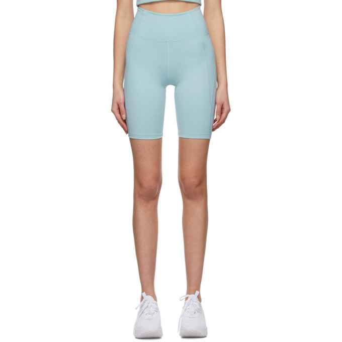 Photo: Girlfriend Collective Blue High-Rise Bike Shorts