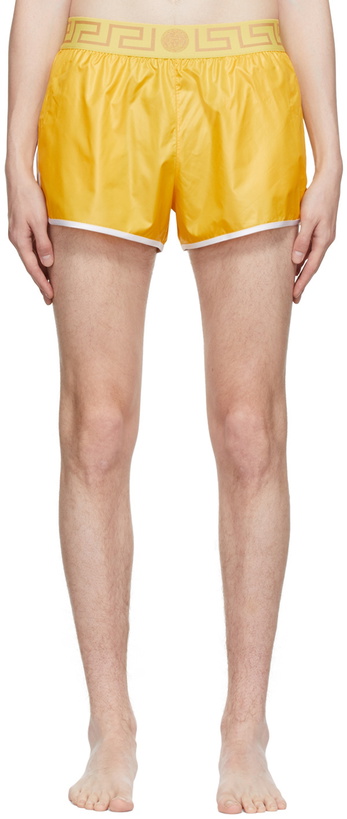 Photo: Versace Underwear Yellow Greca Swim Shorts