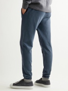 Onia - Tapered Garment-Dyed Cotton-Blend Jersey Sweatpants - Blue