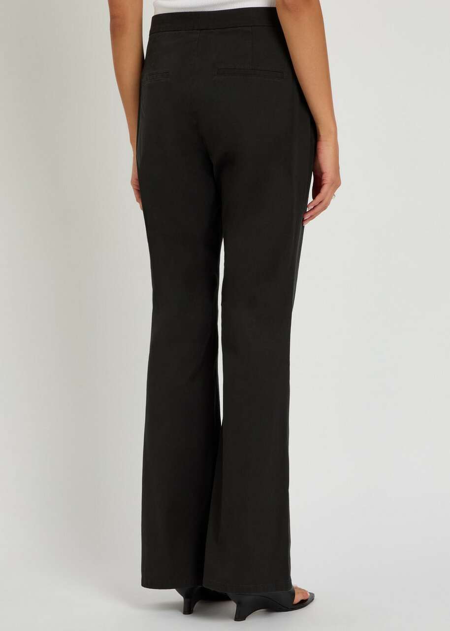 Vince Flared-leg Stretch-cotton Trousers Black