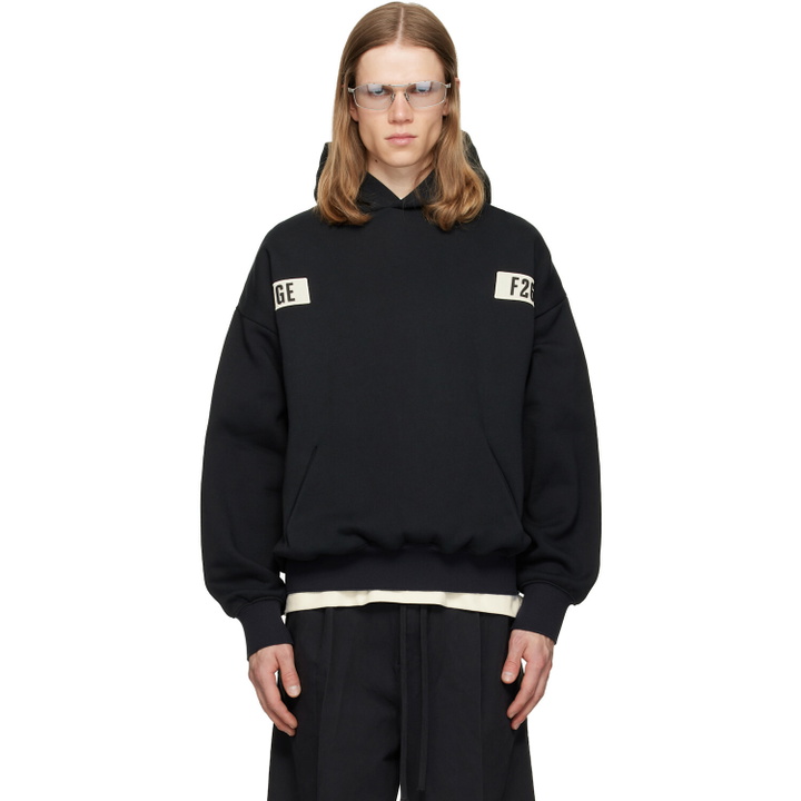 Photo: Fear of God ESSENTIALS Black 90s Hoodie