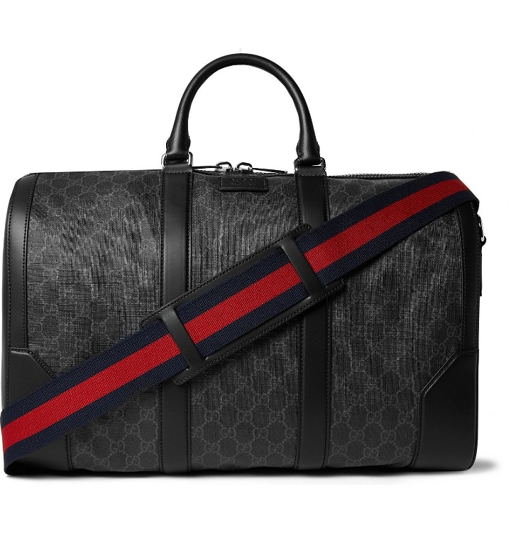Photo: Gucci - Leather-Trimmed Monogrammed Coated-Canvas Holdall - Black
