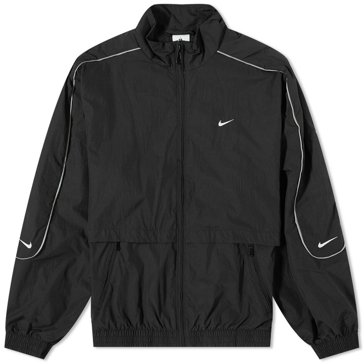 Photo: Nike Men's Solo Swoosh Woven Track Jacket in Black/White