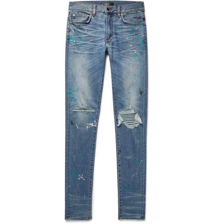 Photo: AMIRI - Skinny-Fit Distressed Paint-Splattered Stretch-Denim Jeans - Light denim