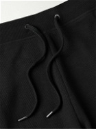 Onia - Tapered Waffle-Knit Cotton-Blend Sweatpants - Black