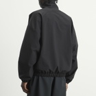 Fear of God ESSENTIALS Men's Active Trace 1/2 Zip Track Jacket in Vintage Black