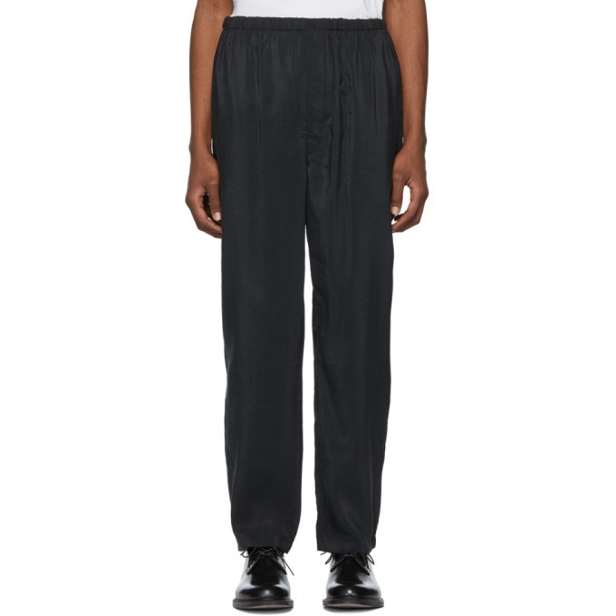 Photo: Lemaire Black Dry Silk Trousers