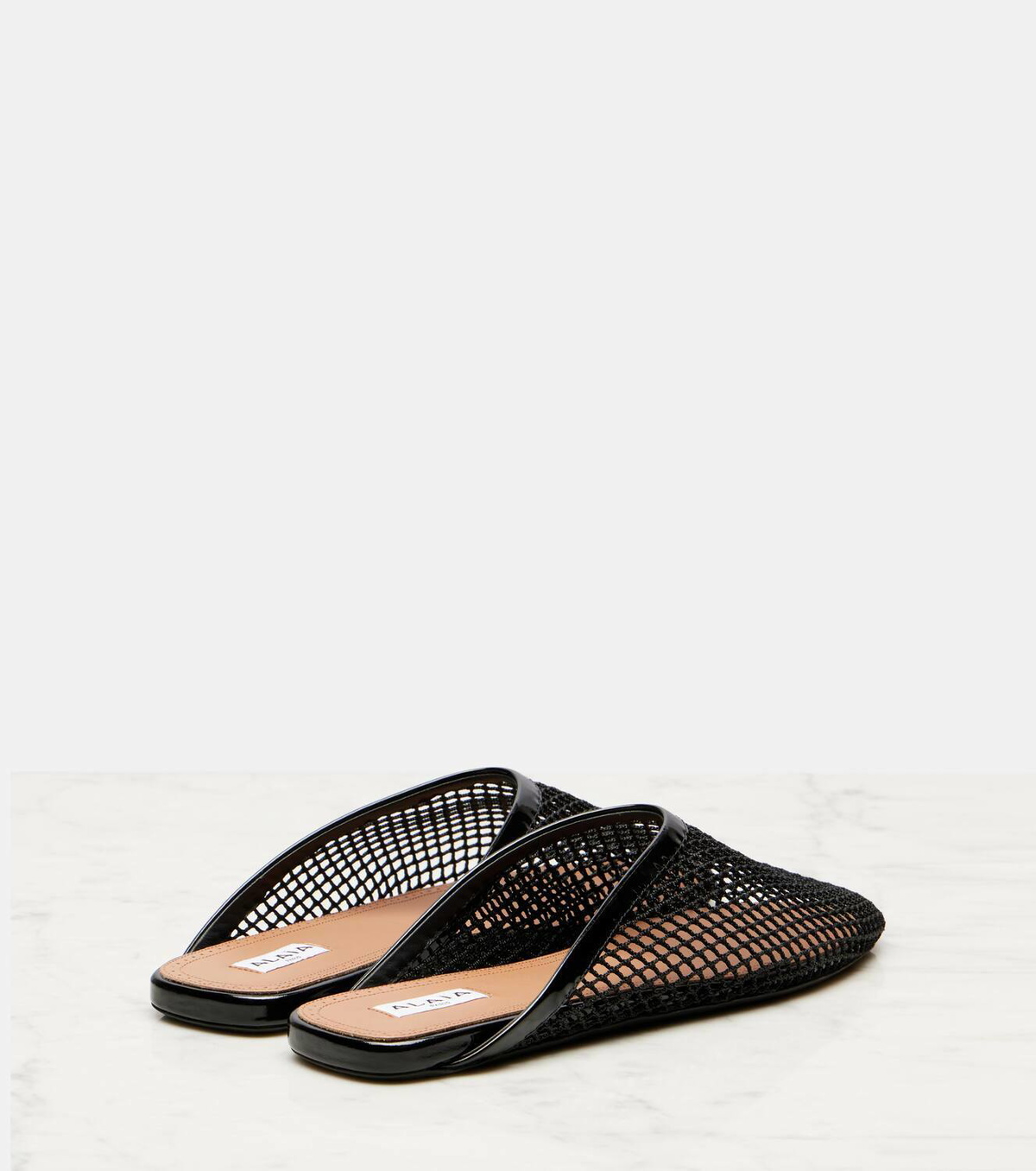 Alaïa Patent leather-trimmed fishnet mules