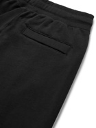 NIKE - Sportswear Tapered Logo-Embroidered Loopback Cotton-Jersey Sweatpants - Black