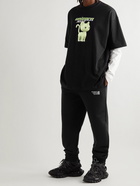 VETEMENTS - Tapered Logo-Print Cotton-Blend Jersey Sweatpants - Black