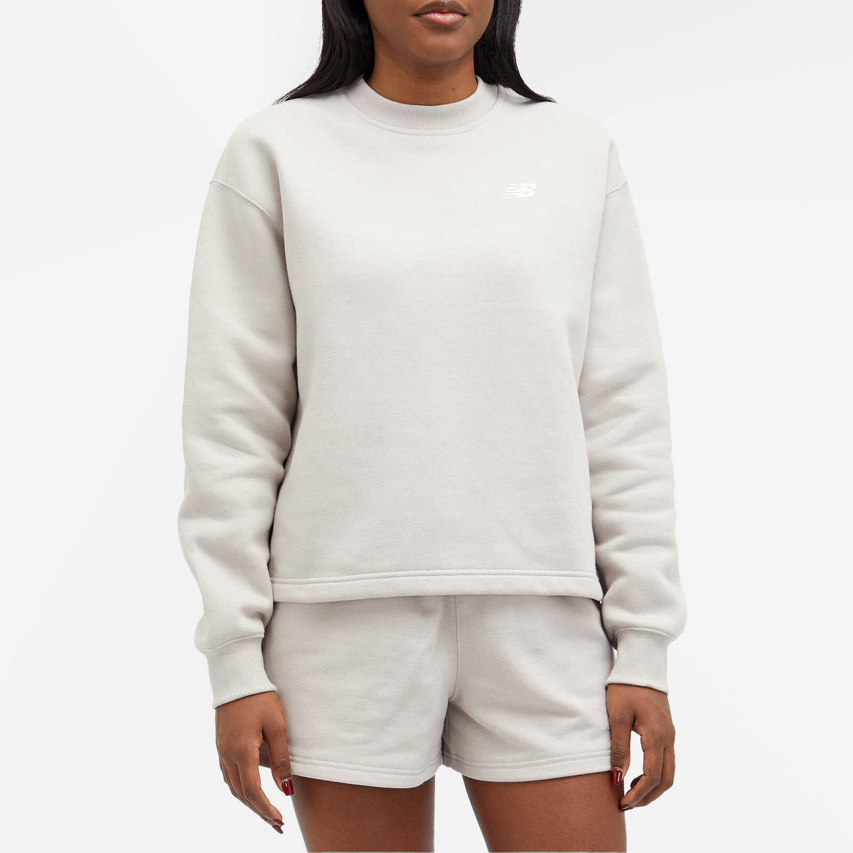 New Balance Women's Linear Heritage Brushed Back Fleece Crewneck in Moonrock