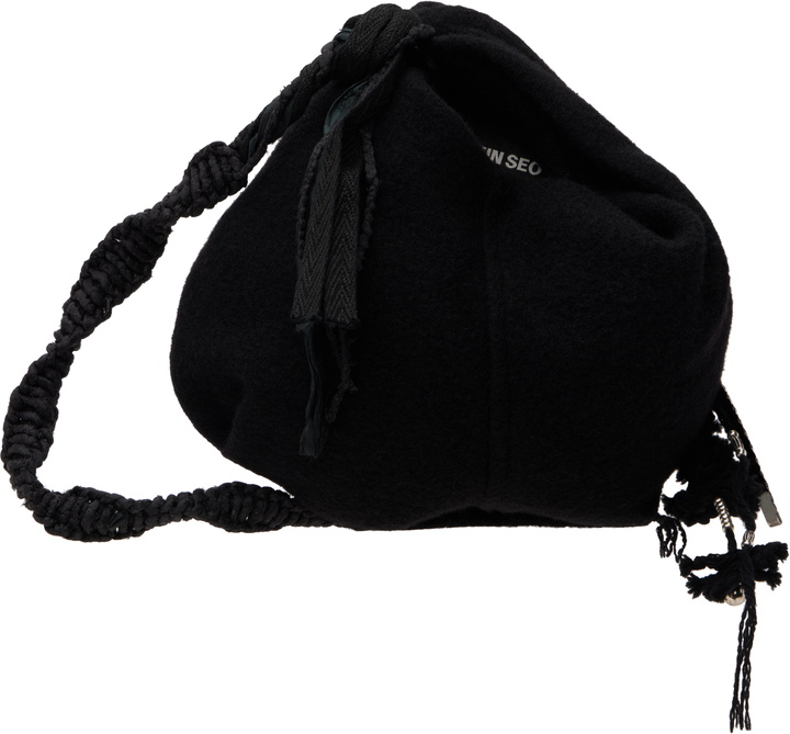 Photo: HYEIN SEO Black Tassel Charm Mini Bag