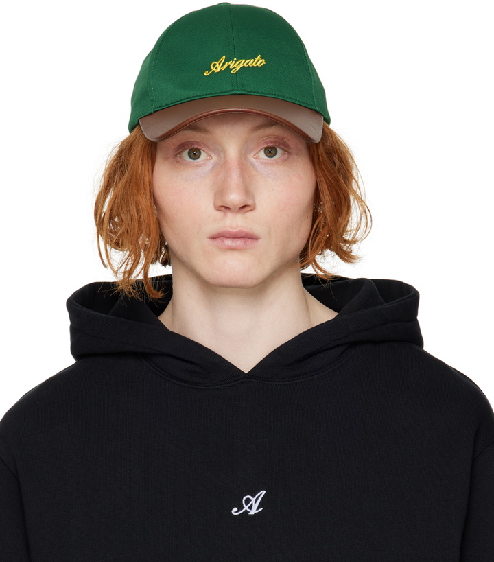 Photo: Axel Arigato Green & Brown Script Cap