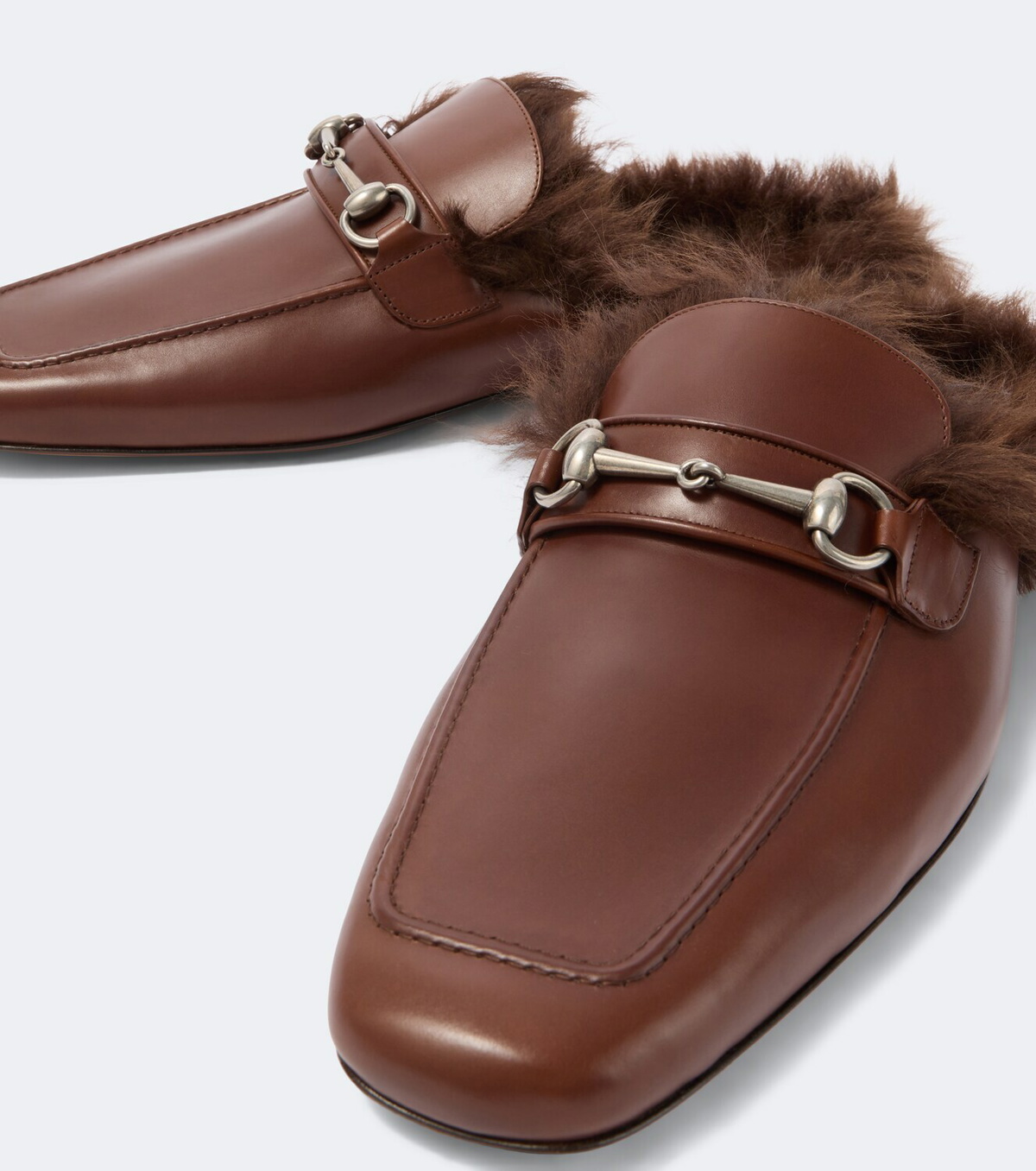 Gucci Horsebit shearling-lined leather mules
