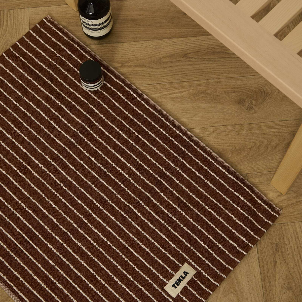 Tekla Fabrics Organic Terry Bath Mat in Rust Stripes 