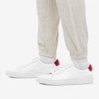 Woman by Common Projects Women's Retro Low Sneakers in White/Red