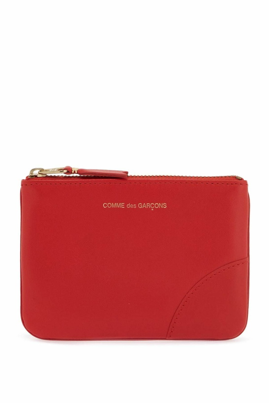 Photo: COMME DES GARCONS WALLET small smooth leather pouch Orange