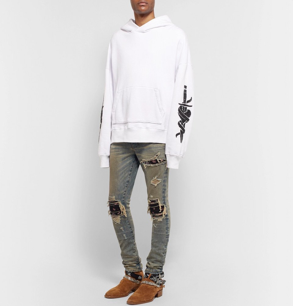 AMIRI - MX1 Skinny-Fit Rib-Panelled Distressed Stretch-Denim Jeans - Men - Blue