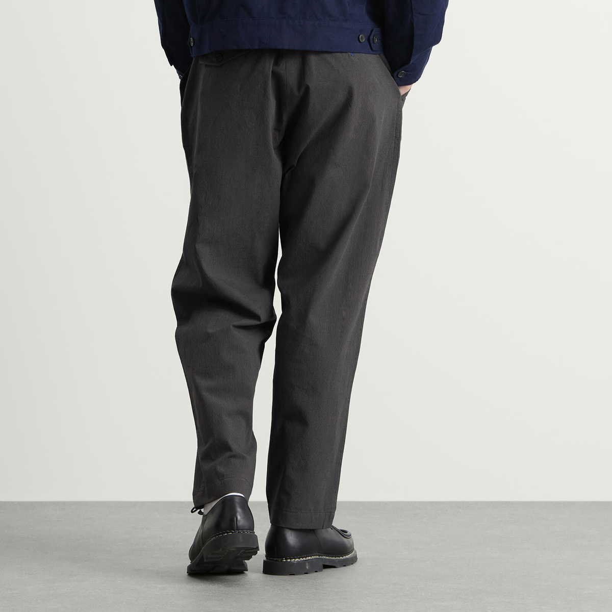Universal Works Men's Seattle Cotton Pleated Track Pant in Charcoal