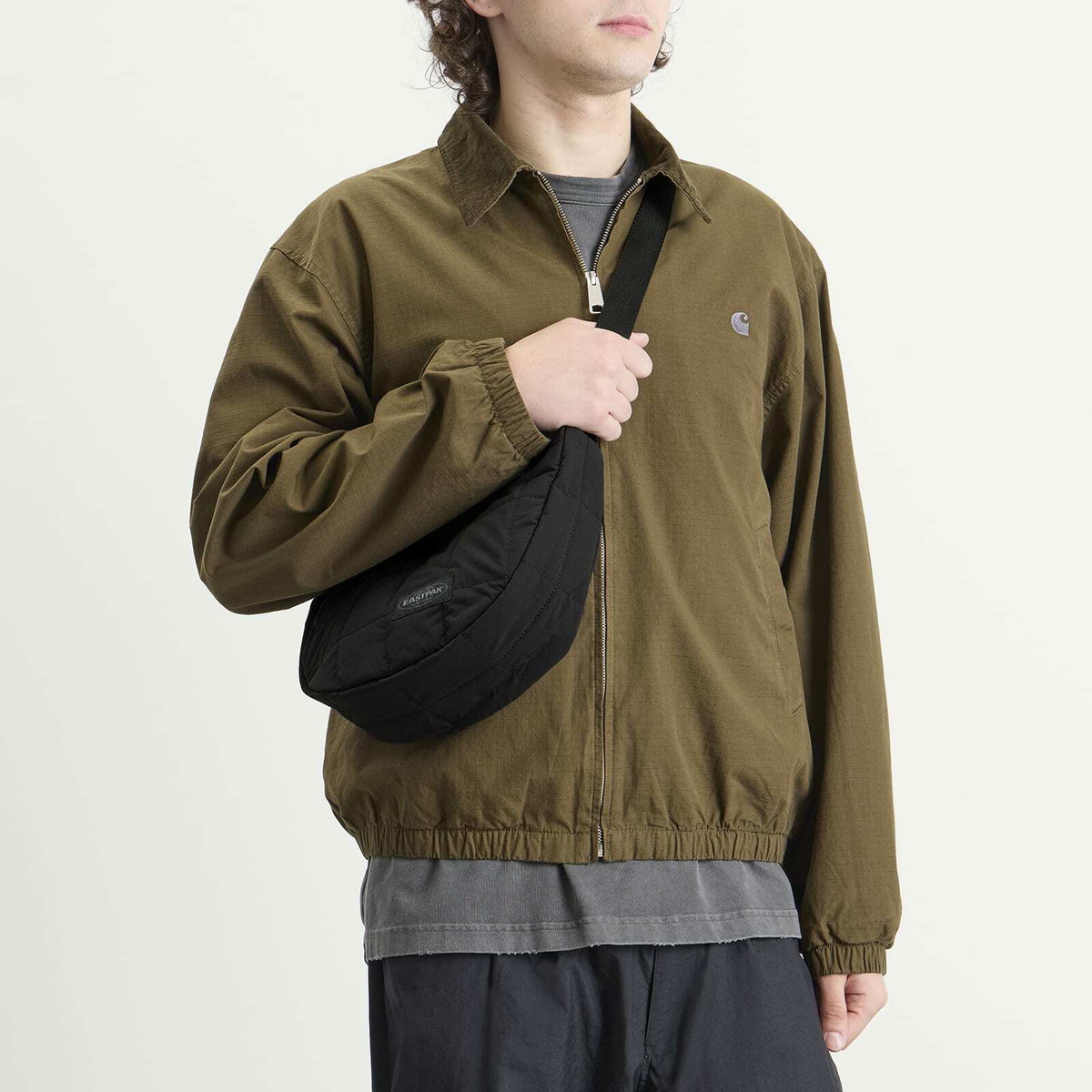 Eastpak Half Moon Cross Body Bag in Puff Checks Black 
