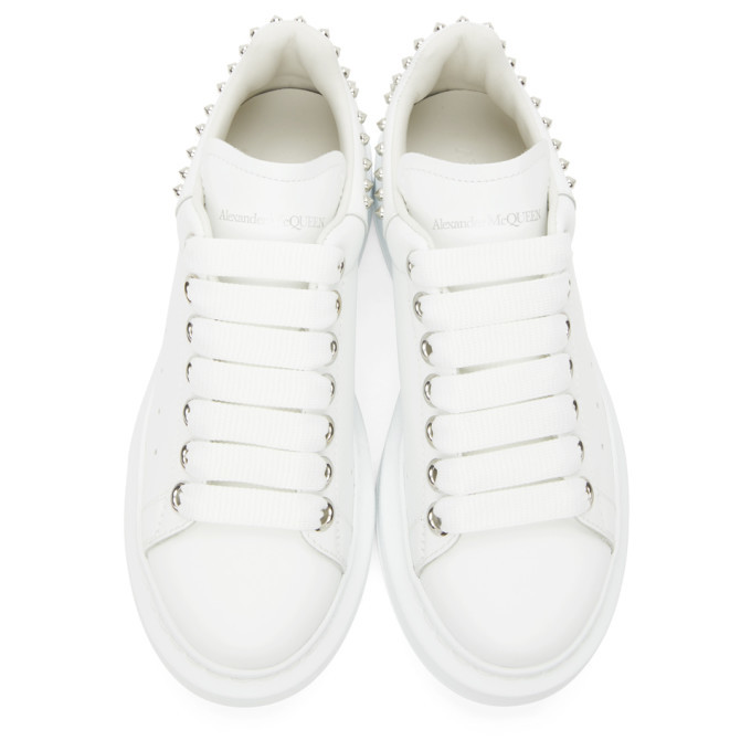 Alexander mcqueen white studded best sale oversized sneakers