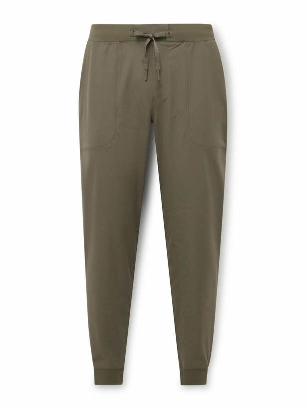 Photo: Lululemon - ABC Tapered Recycled-Warpstreme™ Drawstring Trousers - Green