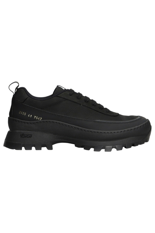 Photo: Common Projects Black Sneakers