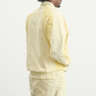 Nike Men's x Nocta Woven Track Jacket in Alabaster/Orange/Platinum