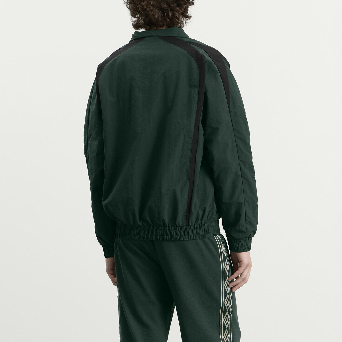 Umbro Men's Relaxed Track Jacket in Pine Grove/Black