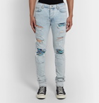 AMIRI - MX1 Skinny-Fit Panelled Distressed Stretch-Denim Jeans - Blue