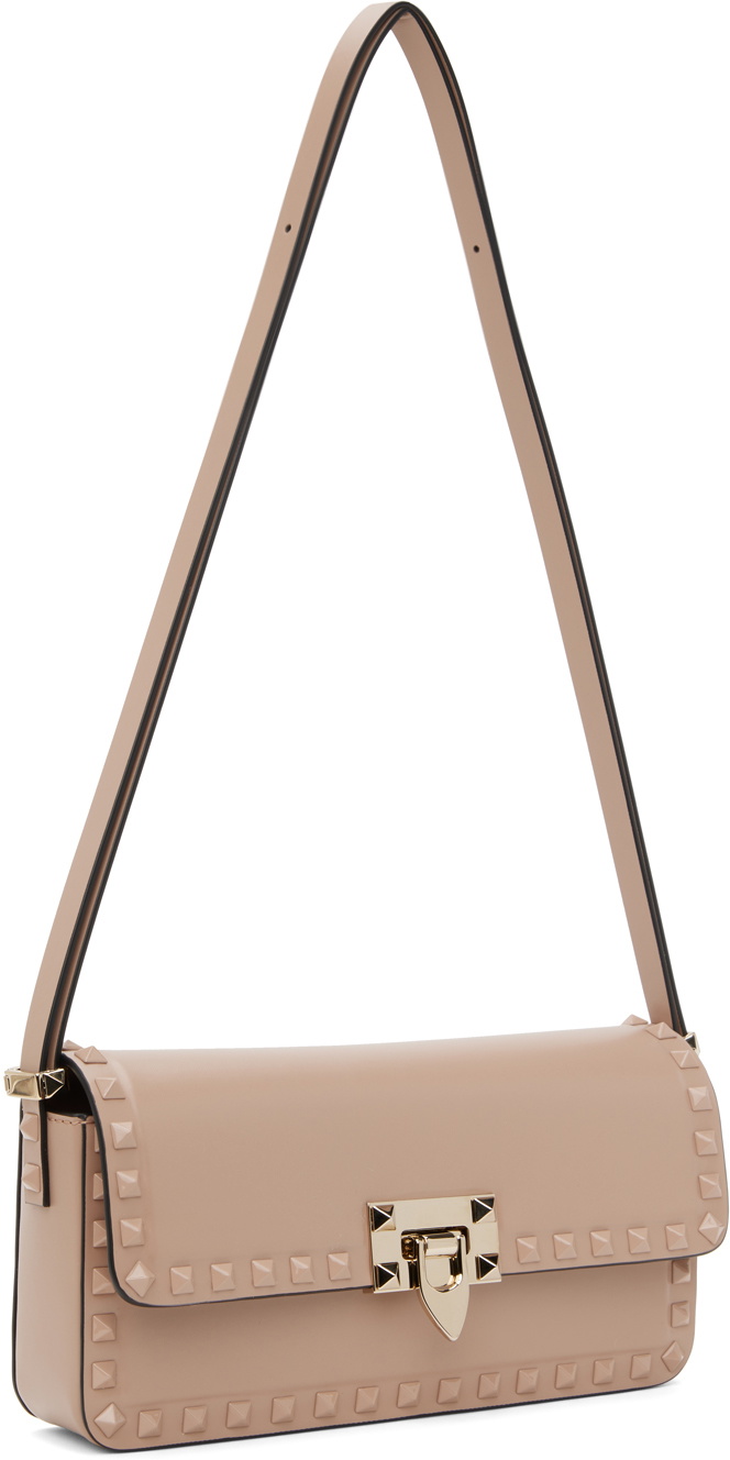 ハンドバッグ Valentino Garavani ROCKSTUD E/W HANDBAG Valentino Garavani Rockstud E/W Leather Handbag | Red | FARFETCH