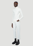 Pleats Please Issey Miyake R-Embroidered Turtleneck Top