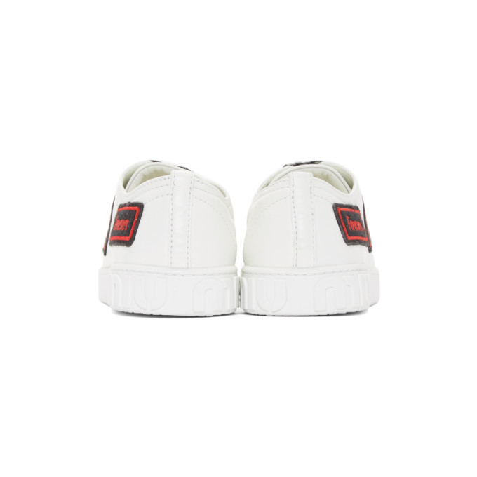 With a white リボントレーン Miu Miu White Gingham Ribbon Sneakers Miu Miu