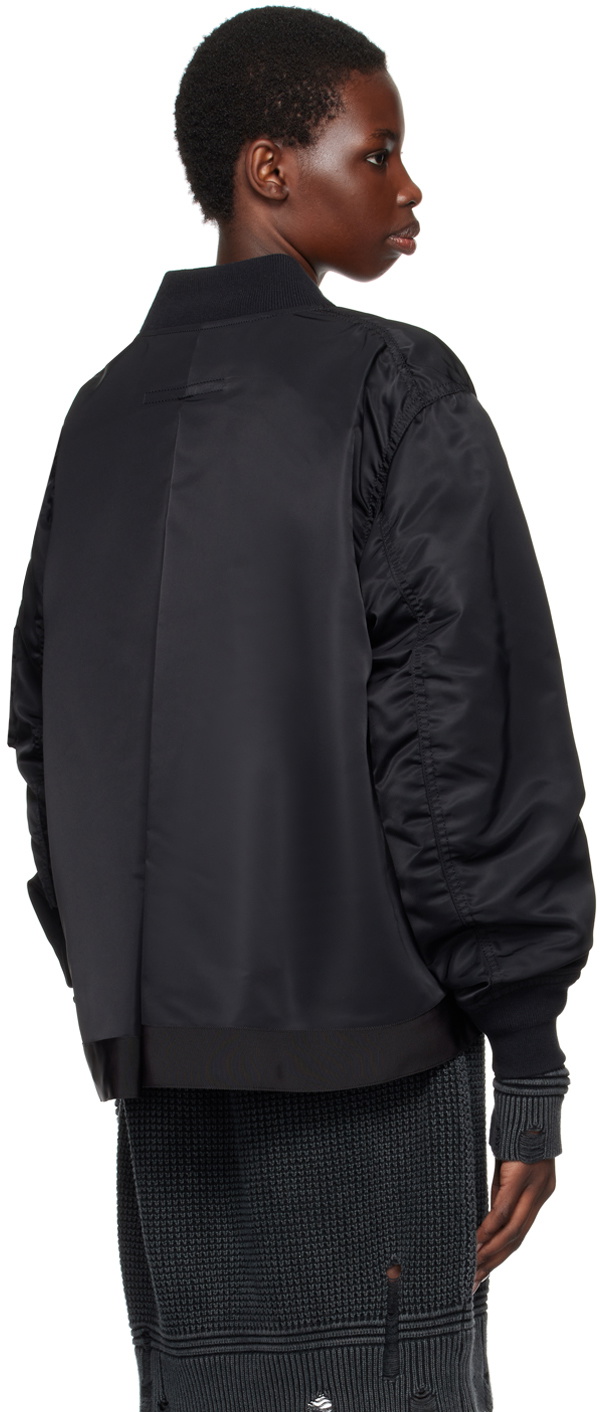 sacai black nylon on feet