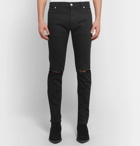 Balmain - Slim-Fit Logo-Embroidered Distressed Denim Jeans - Men - Black