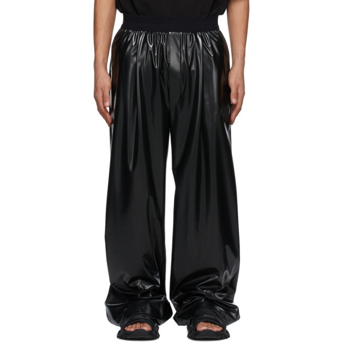 Photo: We11done Black Logo Latex-Textured Trousers