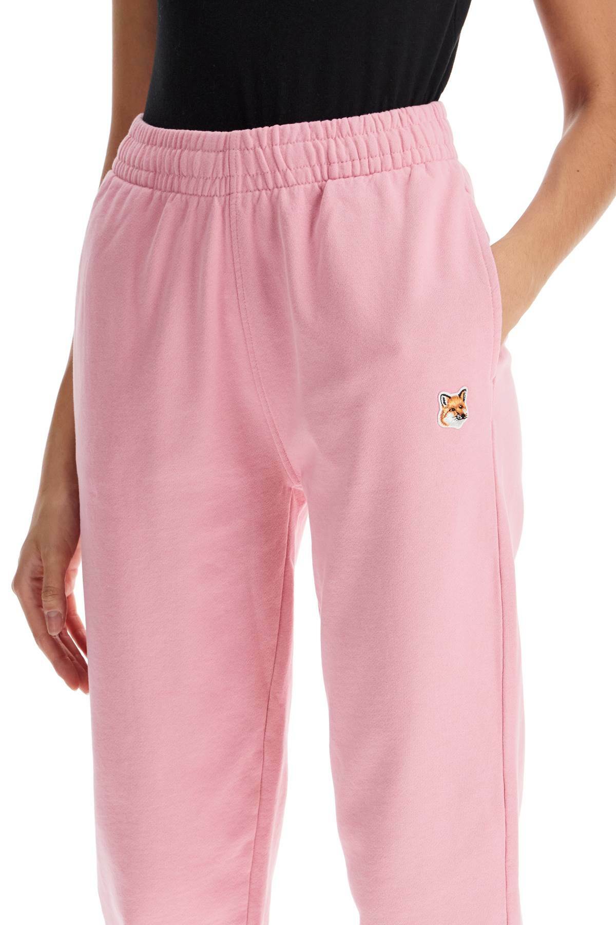MAISON KITSUNE fox head jogging pants Pink
