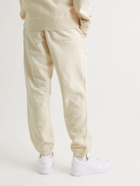 Stussy - Tapered Logo-Embroidered Cotton-Jersey Sweatpants - Neutrals