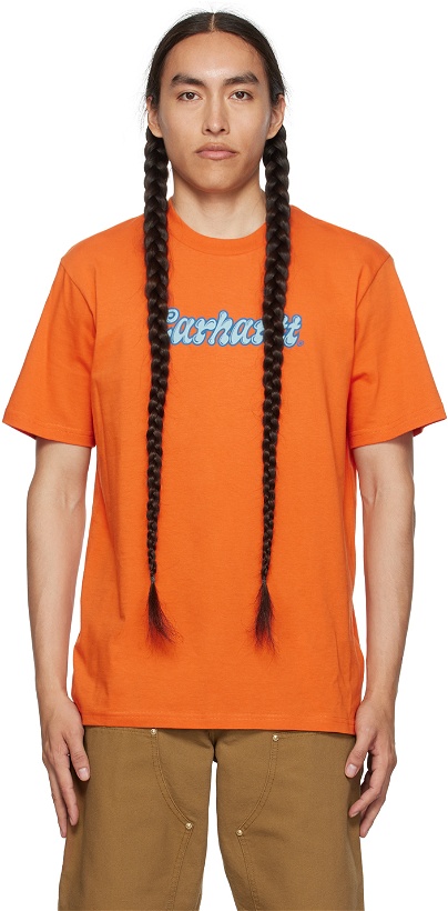 Photo: Carhartt Work In Progress Orange Liquid Script T-Shirt