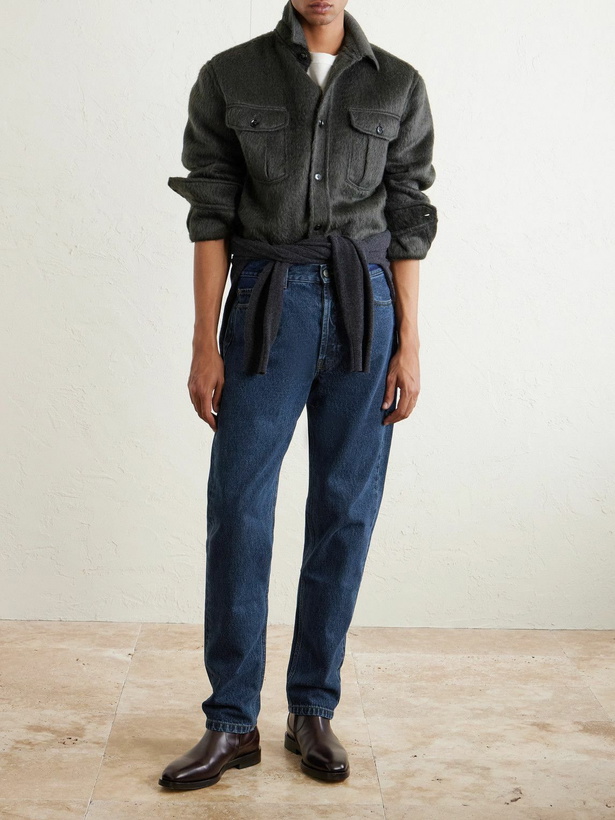 Photo: Thom Sweeney - Straight-Leg Distressed Jeans - Blue
