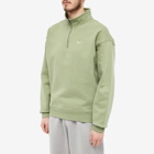 Nike Men's Solo Swoosh Quarter-Zip in Oil Green/White