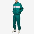 Adidas 80s Woven Track Pants in Collegiate Green