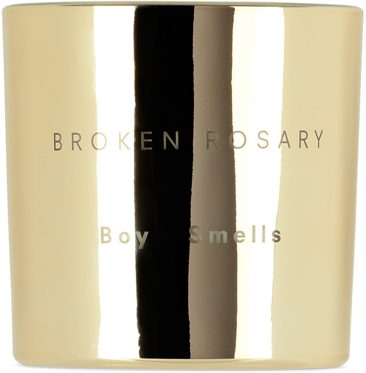 Photo: Boy Smells Broken Rosary Magnum Candle