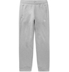 ADIDAS ORIGINALS - Slim-Fit Tapered Logo-Embroidered Mélange Loopback Cotton-Jersey Sweatpants - Gray